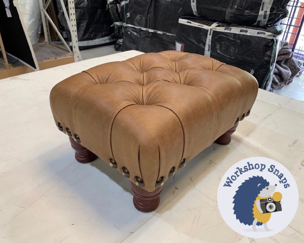 Very small rectangle padded footstool in real brown leather with buttons