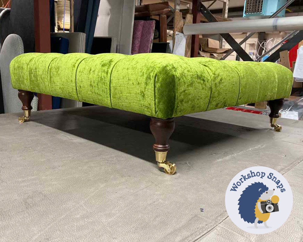 Large square bright green crushed velvet fabric footstool with buttons and gold castors
