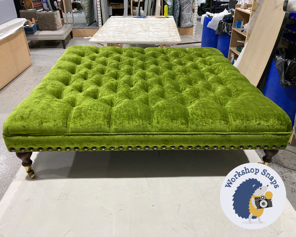 large square bright green crushed velvet fabric footstool with buttons and stud detail